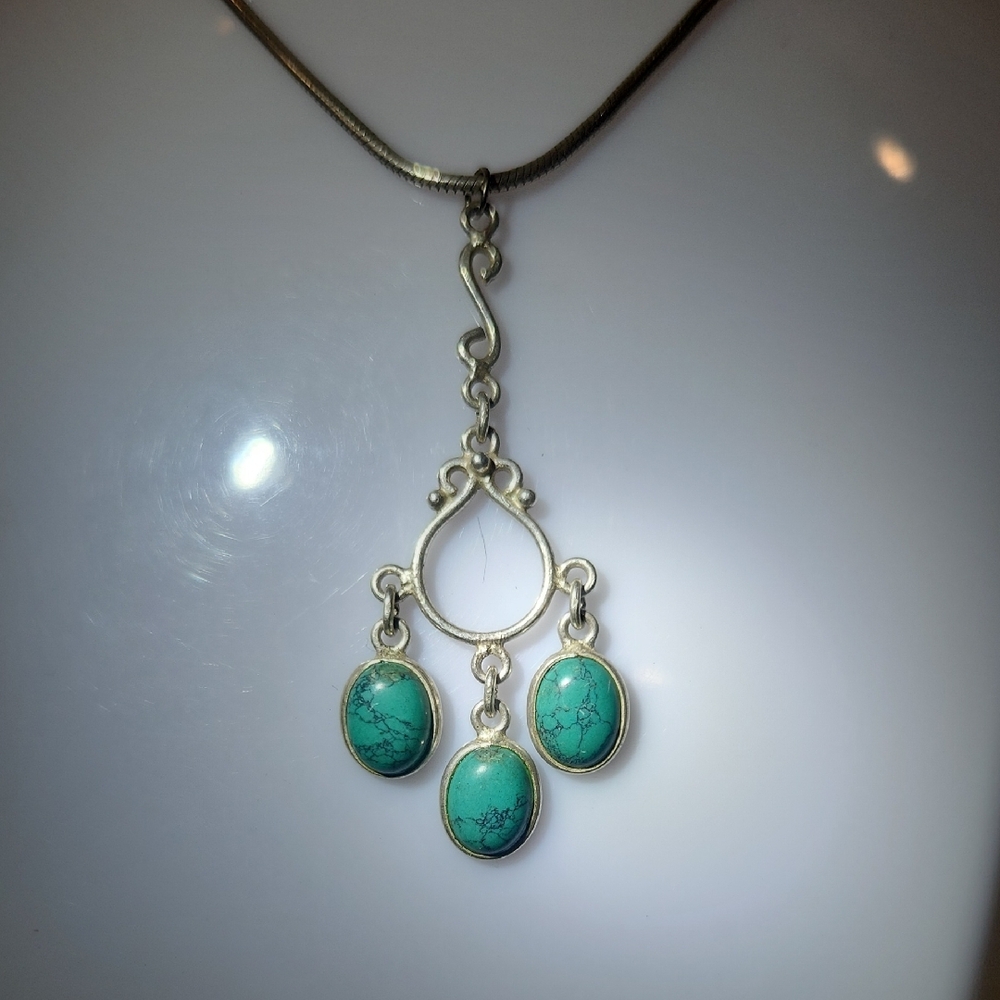 Elegant Silver and Turquoise Pendant Necklace